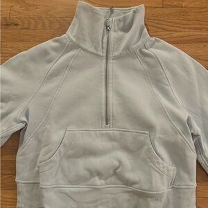 This is a lulemon quarter zip (style without hood) scuba. It is pastel blue